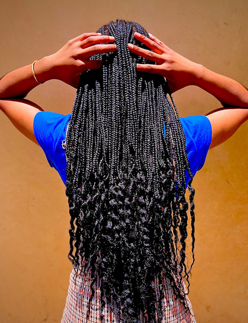 Long Curly-Ended Knotless Braids